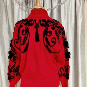 Chic Red Turtleneck Sweater with Black Detailing